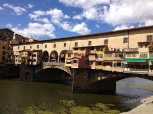 Walking across this bridge, you will find wall to wall jewelry stores . . . Ponte Vecchio means the "Old Bridge", but often people call it the "Gold Bridge".