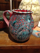 My pitcher, with one of Jennifer's vessels behind it.